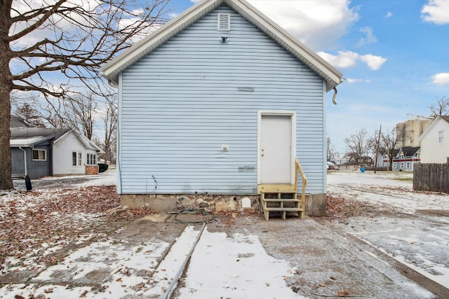 view of snow covered property