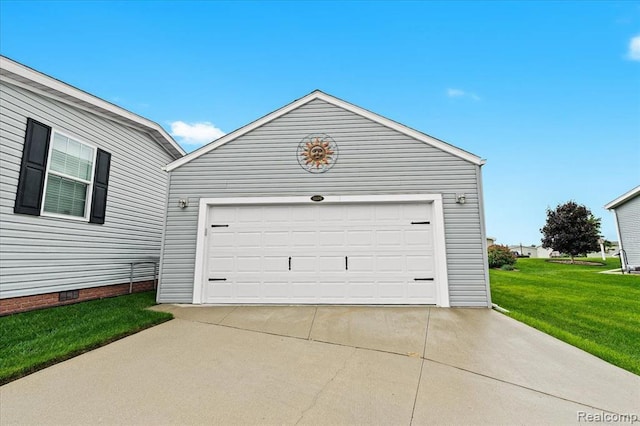 garage with a lawn