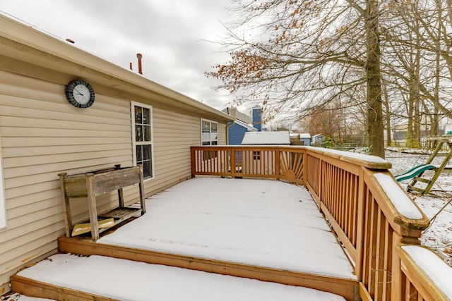 view of snow covered deck