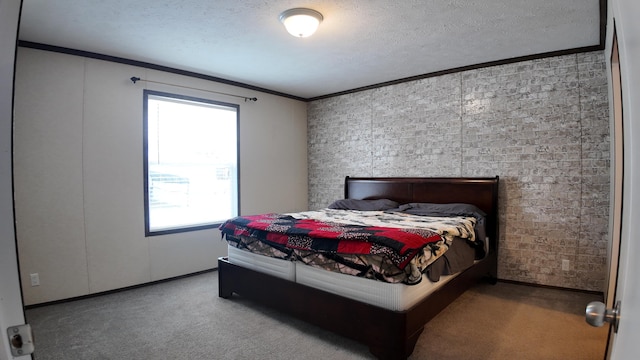 bedroom featuring carpet flooring, a textured ceiling, and ornamental molding