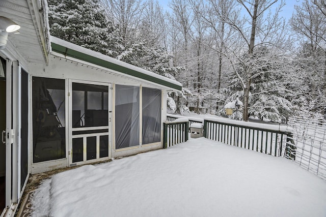 view of snow covered deck