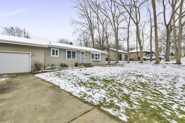 single story home featuring a garage