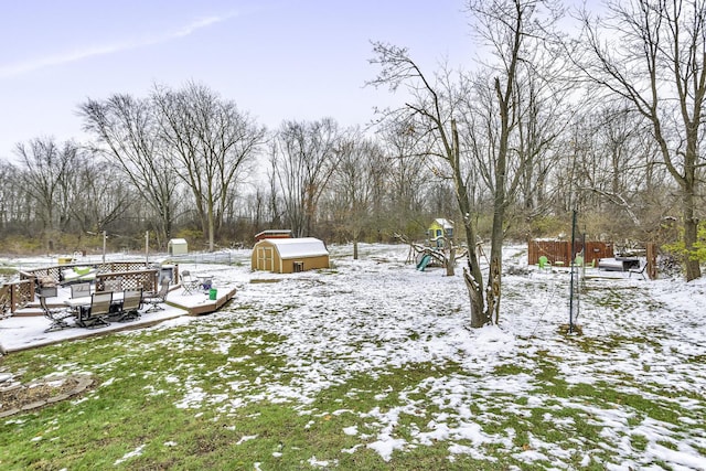 view of yard covered in snow