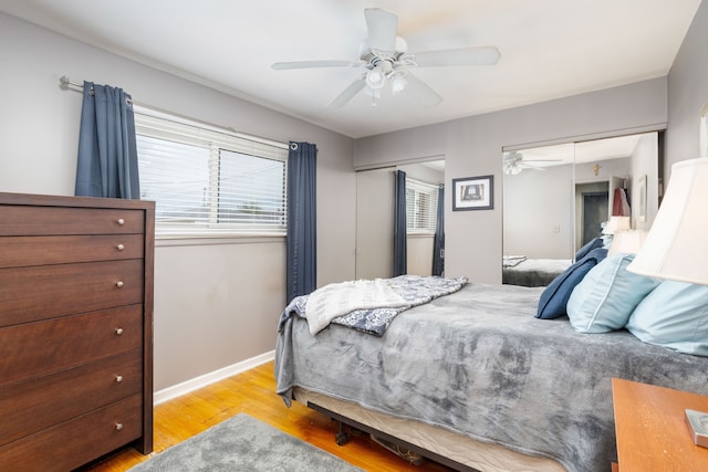 bedroom featuring light hardwood / wood-style flooring and ceiling fan