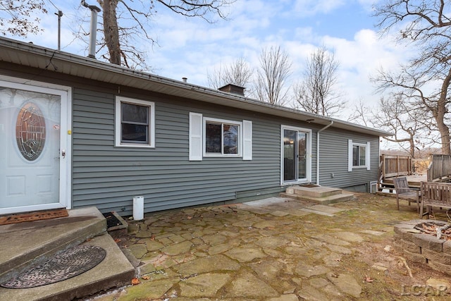 rear view of property with a patio area