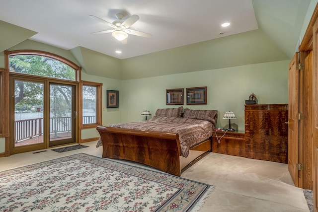 bedroom featuring access to outside, ceiling fan, light colored carpet, and vaulted ceiling