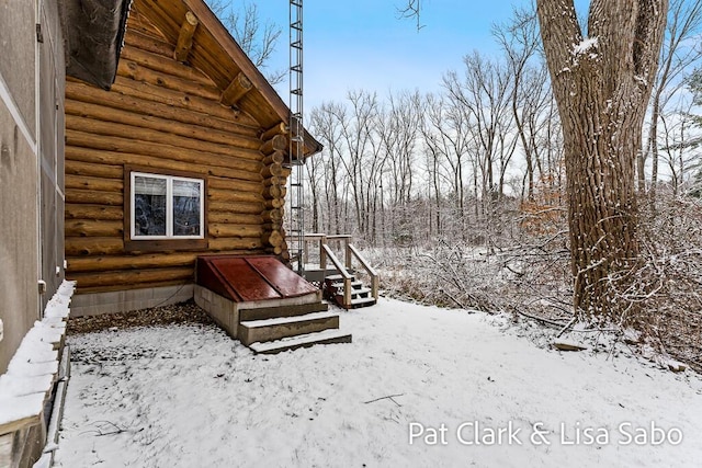 view of yard covered in snow