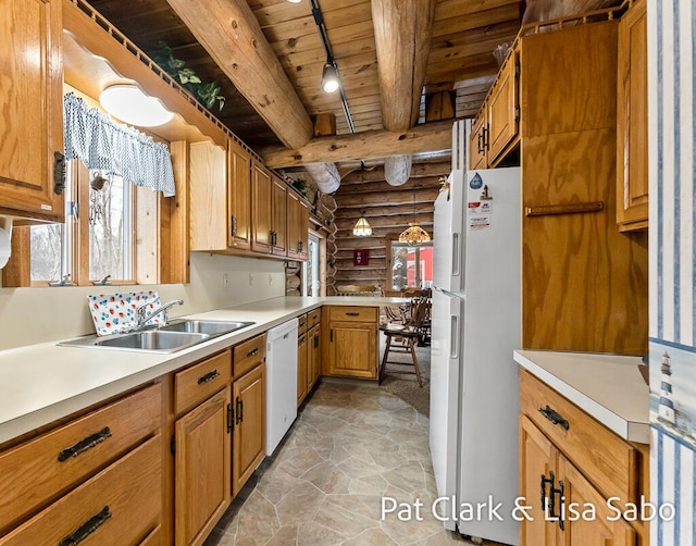 kitchen featuring wood ceiling, white appliances, sink, decorative light fixtures, and beamed ceiling