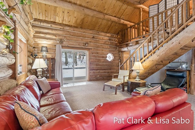 living room featuring beam ceiling, carpet floors, log walls, and wooden ceiling