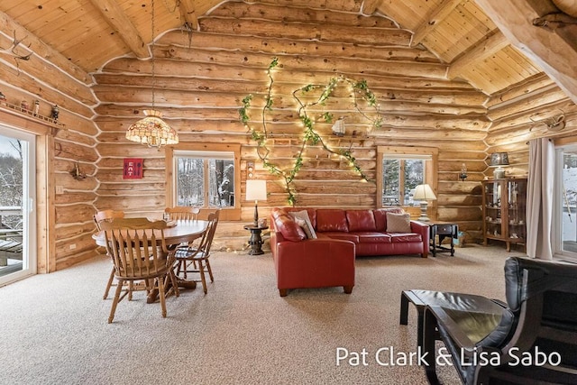 dining area featuring wood ceiling, rustic walls, a healthy amount of sunlight, and beam ceiling