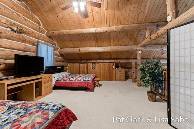 bedroom with rustic walls, lofted ceiling with beams, and wood ceiling