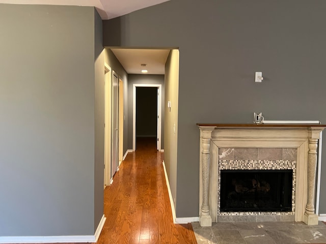 hall with wood-type flooring