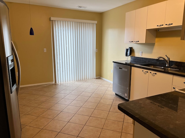 kitchen with dishwasher, sink, hanging light fixtures, refrigerator with ice dispenser, and white cabinets