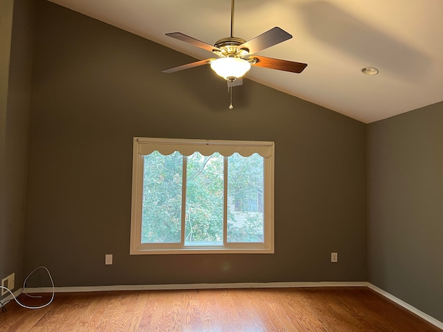 unfurnished room featuring light wood-type flooring, ceiling fan, and lofted ceiling