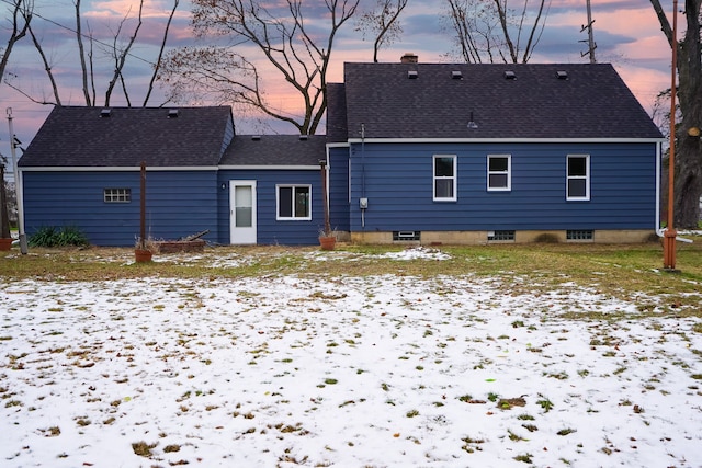 view of snow covered property