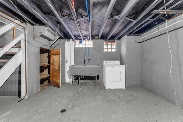 basement with washer / dryer and sink