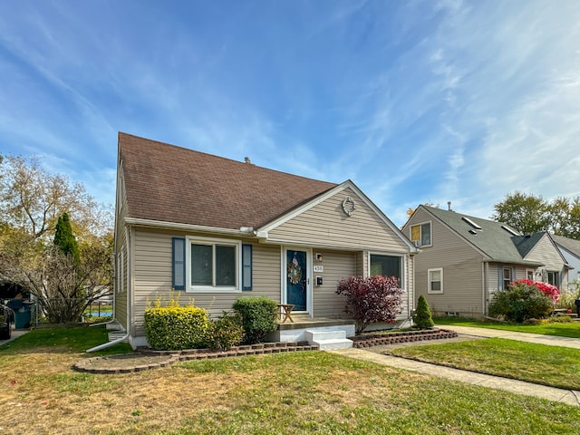 view of front of home with a front yard