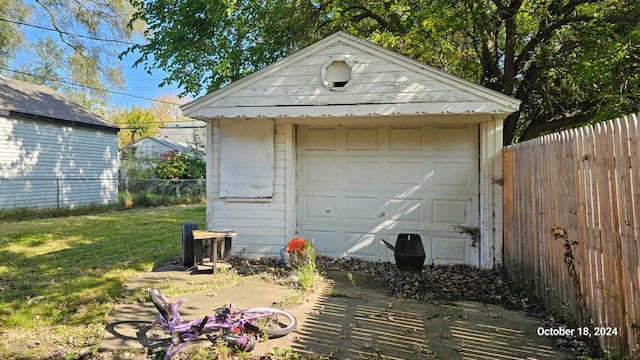 garage with a lawn