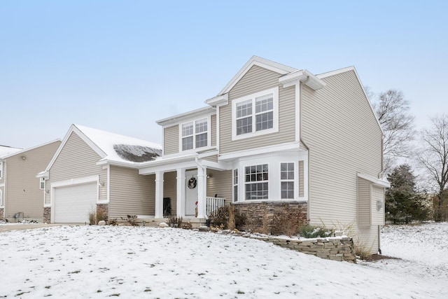 front of property with a garage