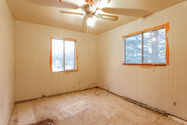 spare room with ceiling fan