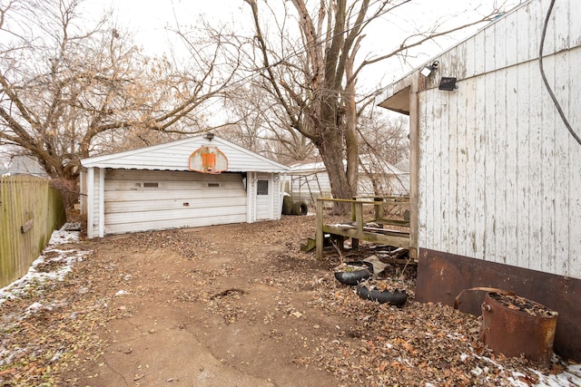 view of side of home with an outbuilding and a garage