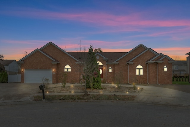 ranch-style house featuring a garage