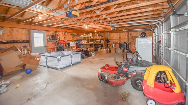 garage featuring a garage door opener