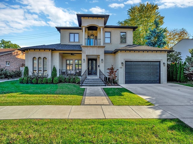 view of front of home featuring covered porch, a garage, and a front lawn