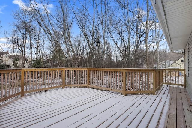 view of snow covered deck