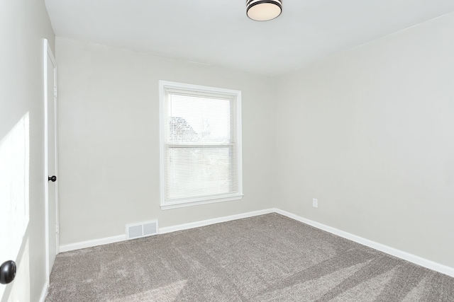 unfurnished room featuring carpet floors