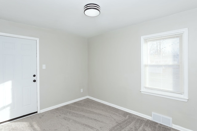 empty room with carpet floors