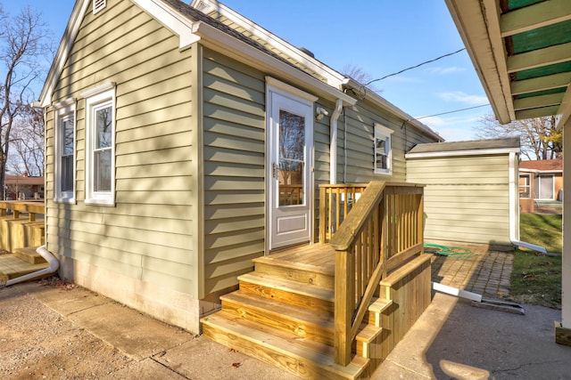 view of side of home featuring a patio