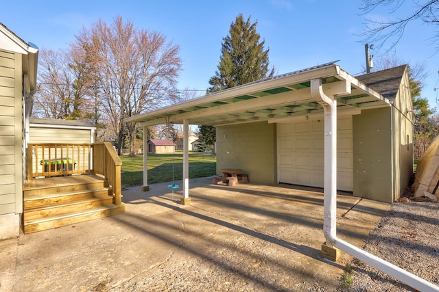 exterior space featuring a carport and a garage