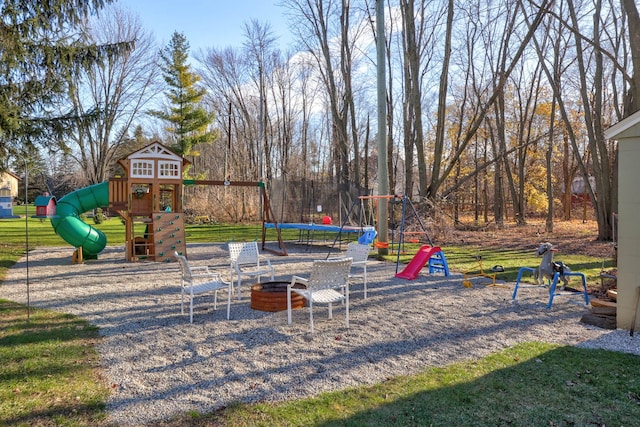 view of play area with an outdoor fire pit