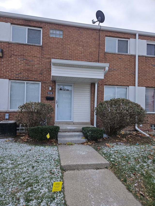 doorway to property with cooling unit