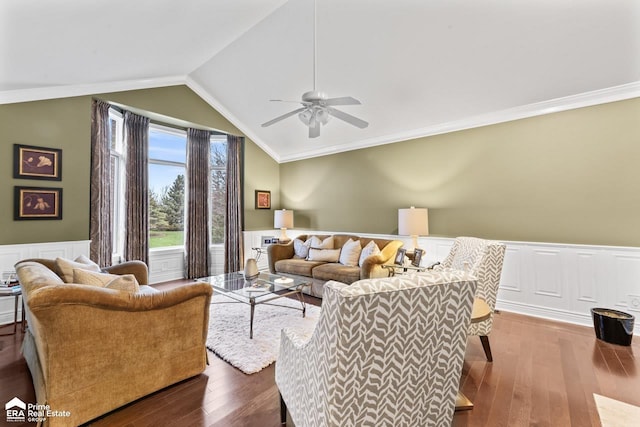 living room with ceiling fan, crown molding, lofted ceiling, and hardwood / wood-style flooring