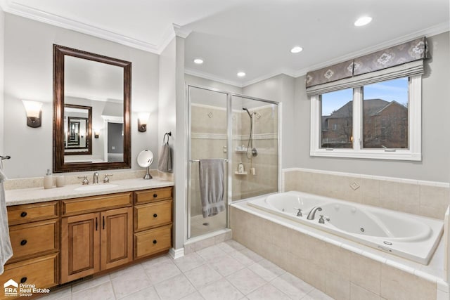 bathroom featuring tile patterned floors, vanity, shower with separate bathtub, and ornamental molding