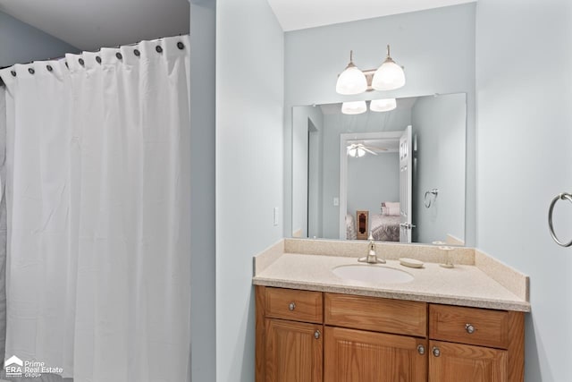 bathroom featuring vanity and ceiling fan