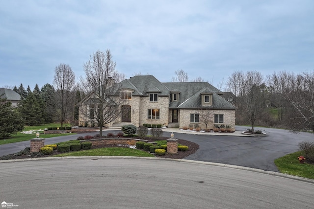 view of french country inspired facade