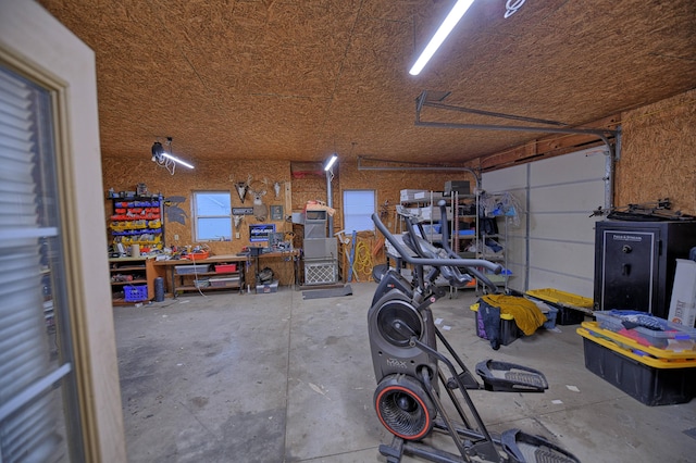 garage featuring a workshop area