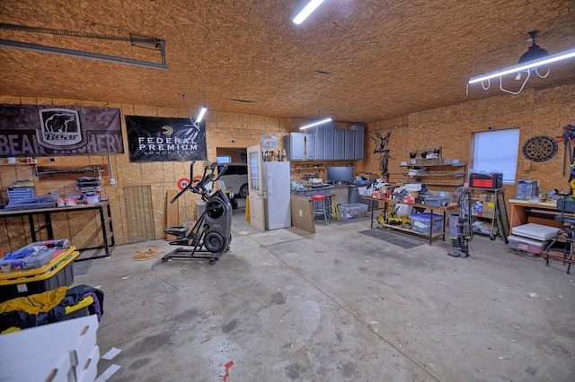 garage featuring a workshop area