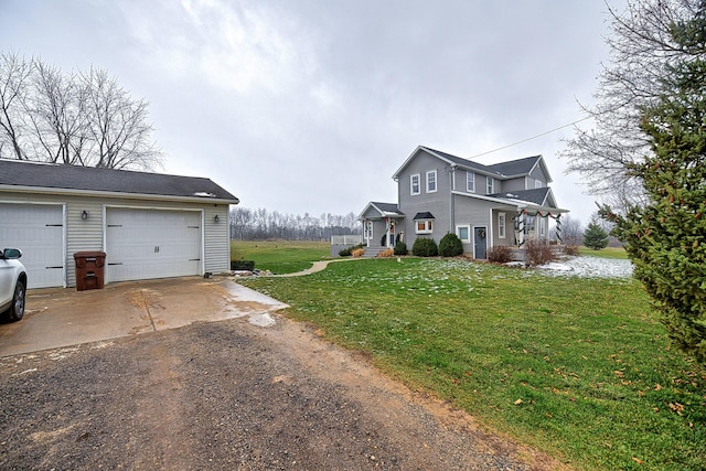 view of home's exterior with a garage and a lawn