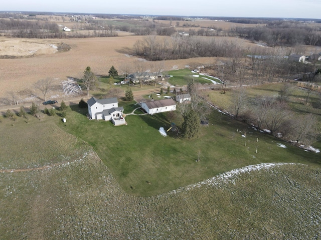 birds eye view of property with a rural view