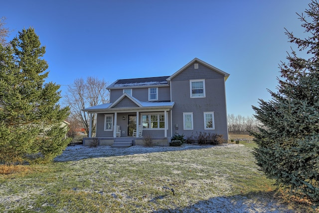 view of front of home featuring a front yard