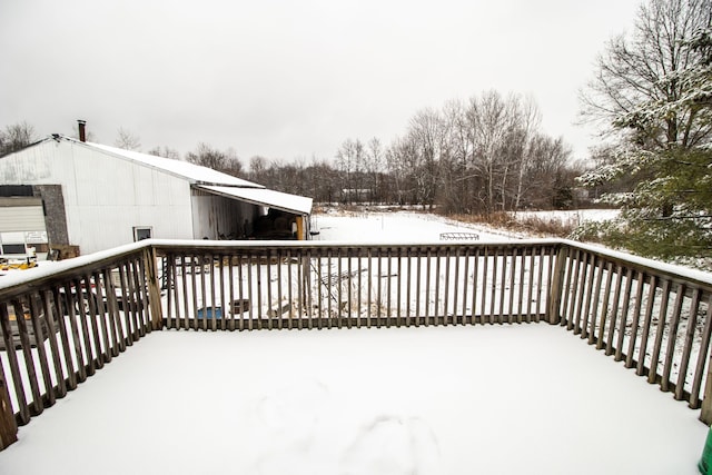 view of snow covered deck