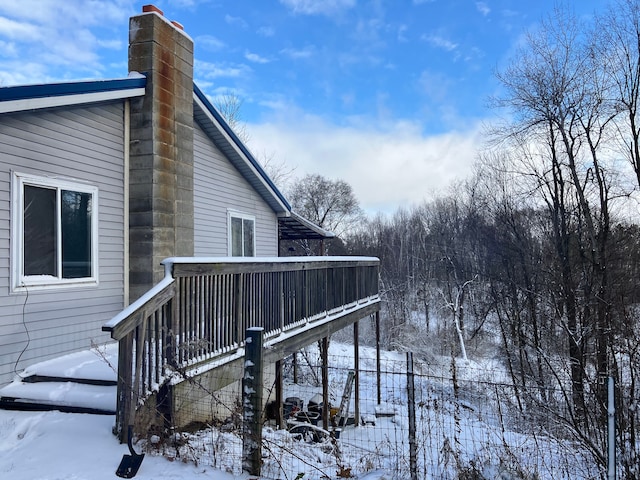 view of snow covered deck