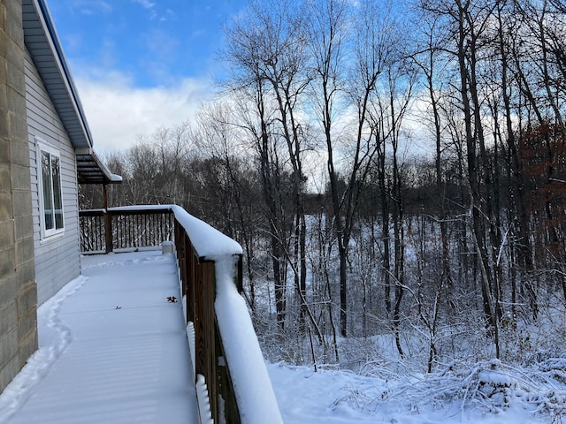 view of snow covered deck