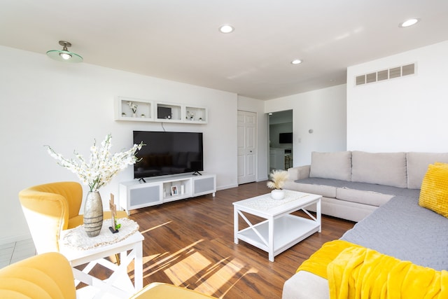 living room featuring dark hardwood / wood-style flooring