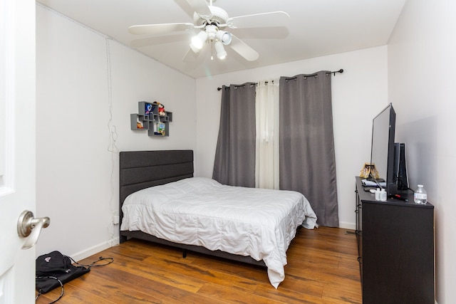 bedroom featuring ceiling fan and hardwood / wood-style floors