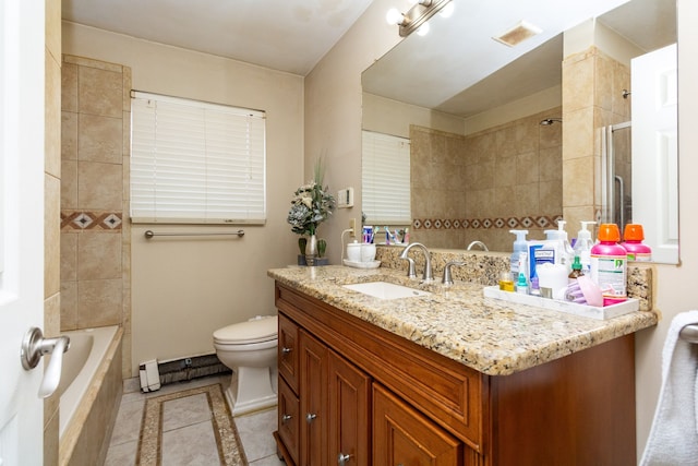 full bathroom with tile patterned flooring, vanity, toilet, and tiled shower / bath